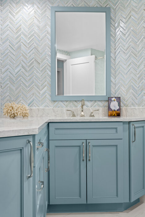 0S3A0813-Edit Blue vanity with quartz countertop and chevron glass tile backsplash